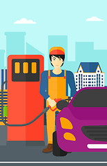 Image showing Man filling up fuel into car.