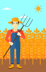 Image showing Farmer with pitchfork.