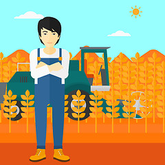 Image showing Man standing with combine on background.