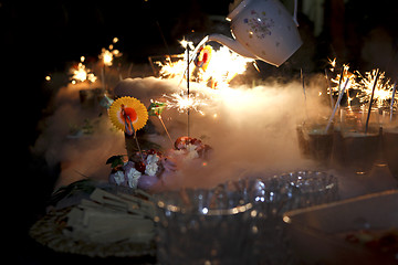 Image showing Fireworks at a table for dessert