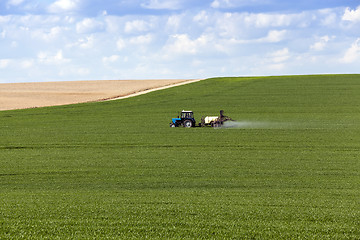 Image showing tractor in the field 