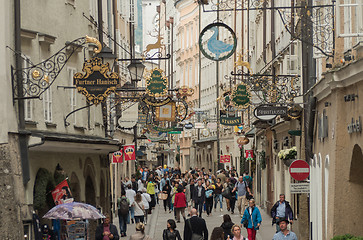Image showing The street full of shops and antiques signs in Salzburg