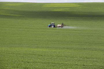 Image showing tractor in the field 