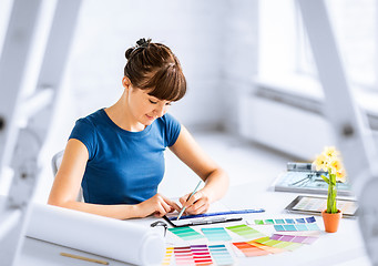 Image showing woman working with color samples for selection