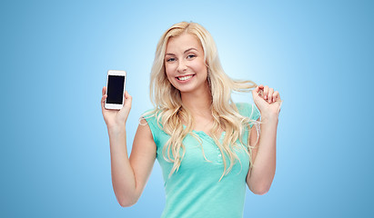 Image showing happy young woman or teenage girl with smartphone
