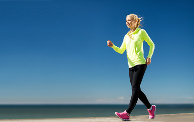 Image showing woman doing sports outdoors