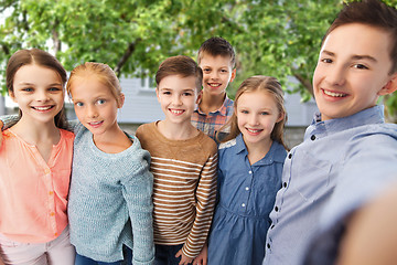 Image showing happy children talking selfie over backyard