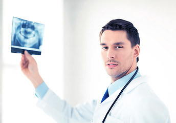 Image showing male doctor or dentist with x-ray