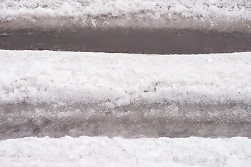 Image showing spring road with snow