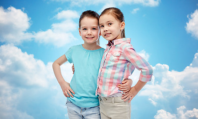 Image showing happy smiling little girls hugging