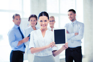 Image showing businesswoman with tablet pc in office