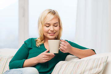 Image showing happy young woman at home