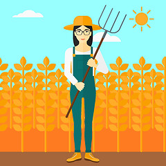 Image showing Farmer with pitchfork.