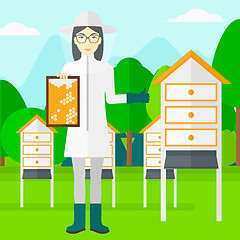 Image showing Bee-keeper at apiary.