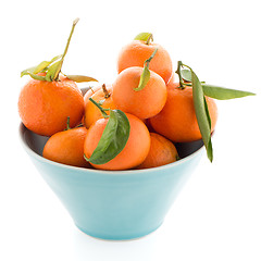 Image showing Tangerines on ceramic blue bowl 