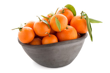 Image showing Tangerines on clay bowl 