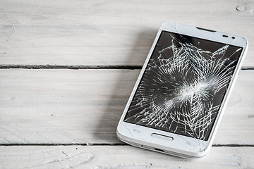 Image showing Smartphone display with broken glass
