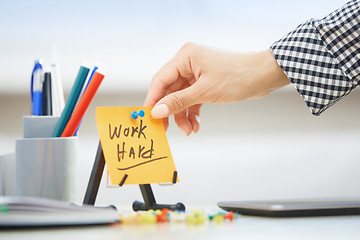 Image showing Work hard text on adhesive note