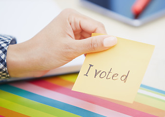 Image showing I voted text on adhesive note