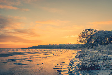 Image showing Frozen lake in the morning sunrise