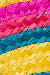 Image showing Colorful background of woven straw