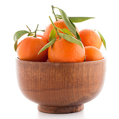 Image showing Tangerines on wooden  bowl 