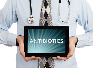 Image showing Doctor holding tablet - Antibiotics