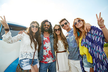 Image showing hippie friends over minivan car showing peace sign