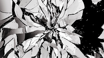 Image showing Shattered and broken glass isolated on black