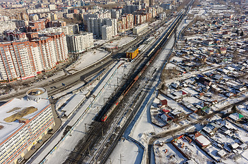 Image showing Train between old and new districts of Tyumen city