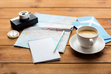 Image showing close up of notepad with map and travel tickets