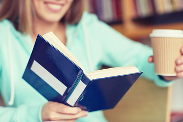 Image showing close up of student reading book at school