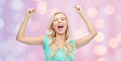 Image showing happy young woman or teen girl celebrating victory