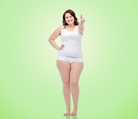 Image showing plus size woman in underwear showing thumbs up