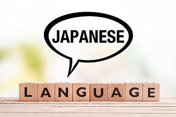 Image showing Japanese language lesson sign on a table