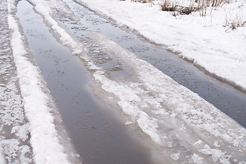 Image showing spring road with snow