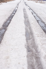 Image showing spring road with snow