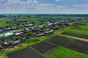 Image showing Novikovo village and fields set with potato