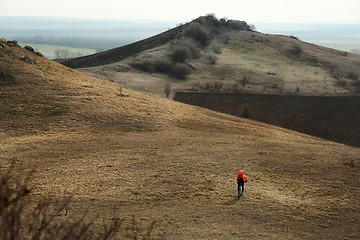 Image showing Man cyclist with backpack riding the bicycle