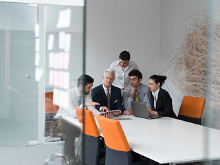 Image showing business people group on meeting at modern startup office