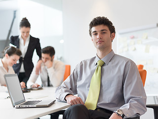 Image showing group of young business people  on meeting at modern startup off