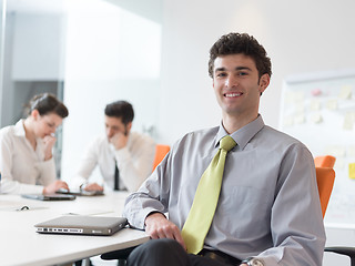 Image showing group of young business people  on meeting at modern startup off