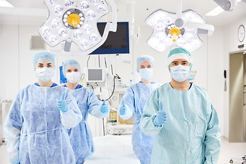 Image showing group of surgeons in operating room at hospital