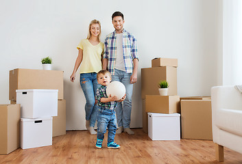 Image showing happy family moving to new home and playing ball