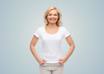 Image showing smiling woman in blank white t-shirt