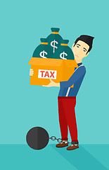 Image showing Chained man with bags full of taxes. 