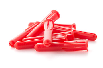 Image showing Red plastic dowels