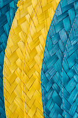 Image showing Colorful background of woven straw