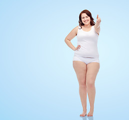 Image showing plus size woman in underwear showing thumbs up