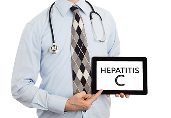 Image showing Doctor holding tablet - Hepatitis C